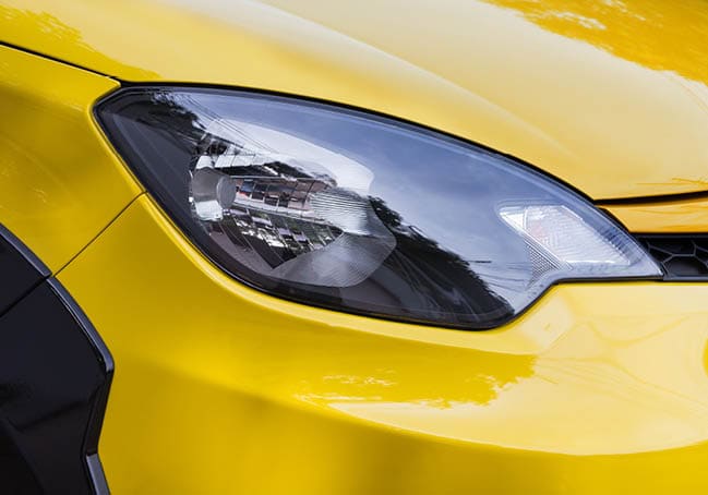 Closeup point on Headlight lamp car.
